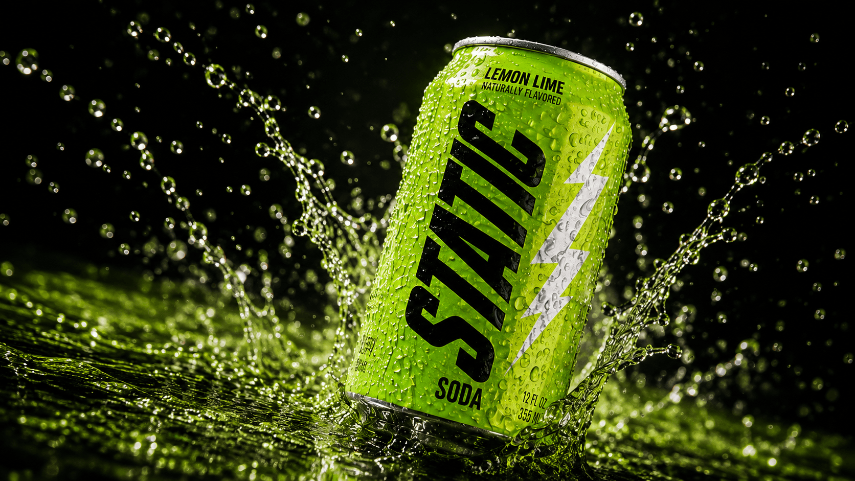 The lemon-lime Static Soda can bursting through water