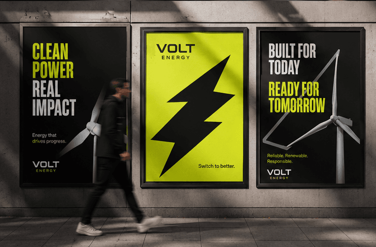 Three Volt Energy campaign posters on a street hoarding